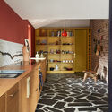 18 Interior Projects that Use Open Storage to Hide Clutter in Plain Sight - Image 10 of 19